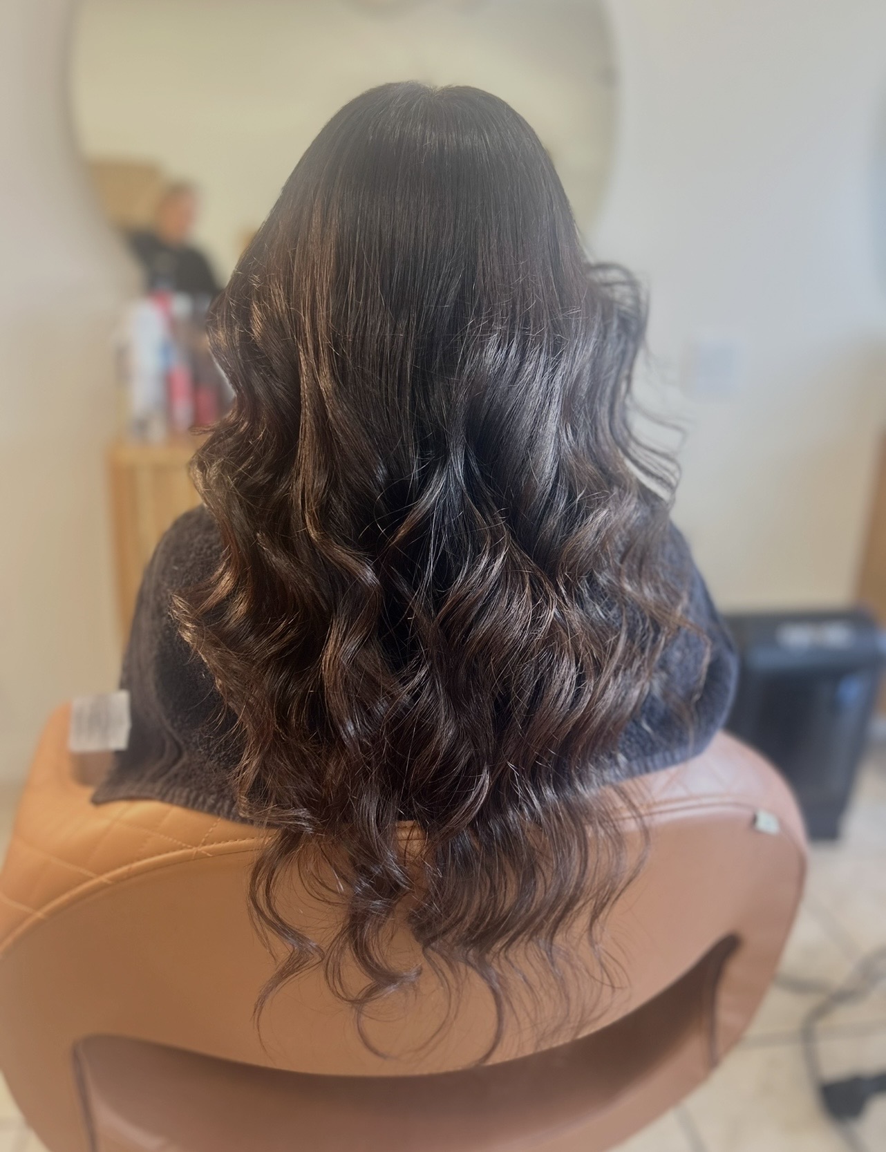 Soft dark waves styled at M Vogue Beauty Salon