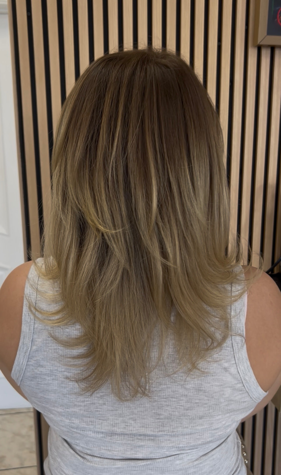Honey bronde layered blowout at M Vogue Beauty Salon