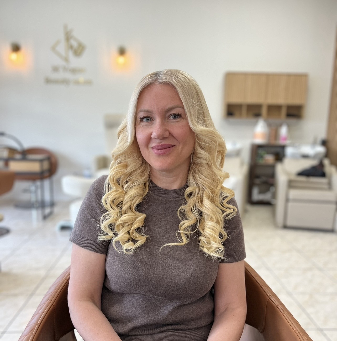 Bright blonde curls styled at M Vogue Beauty Salon
