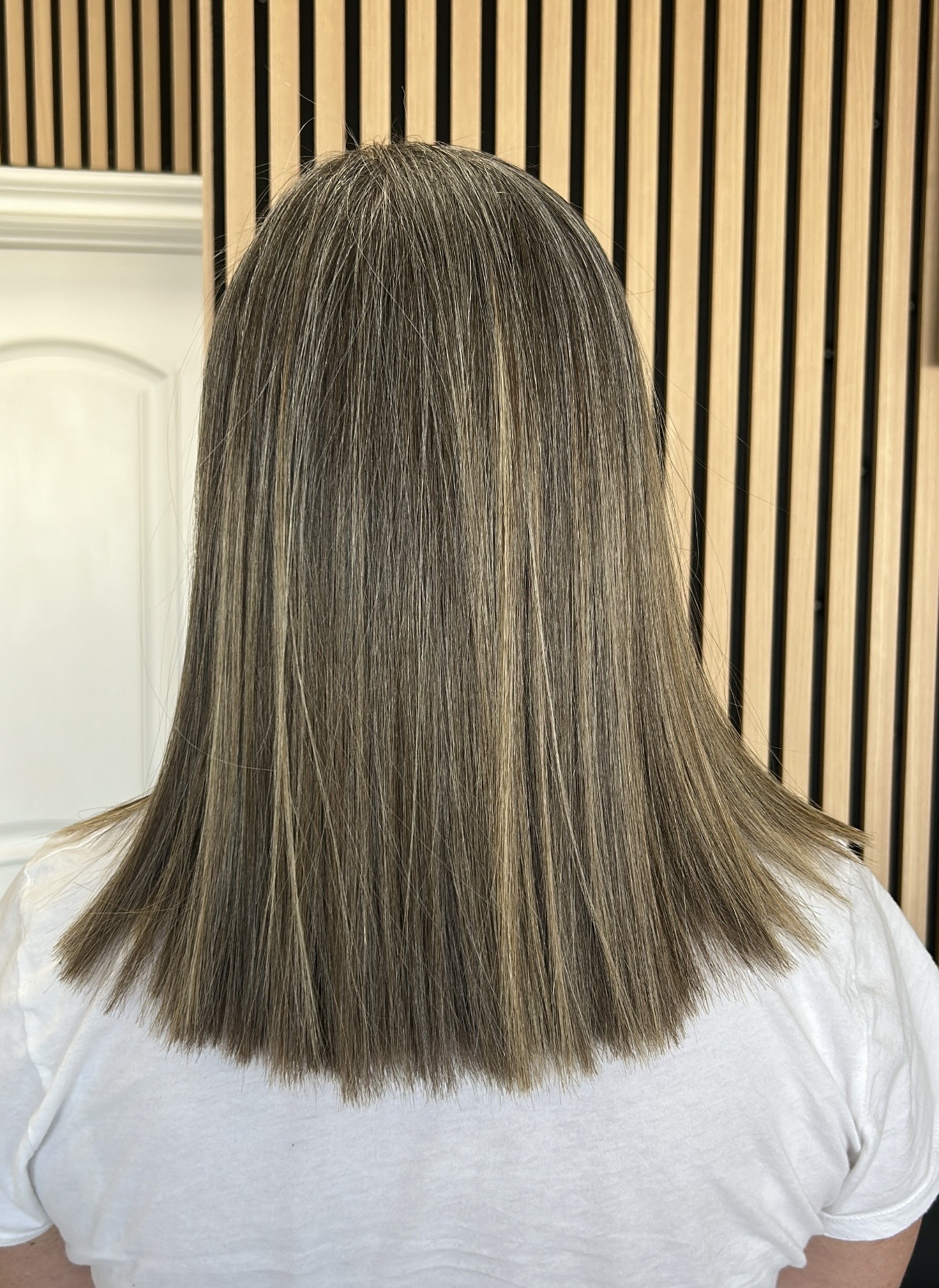 Smooth highlighted blowout at M Vogue Beauty Salon